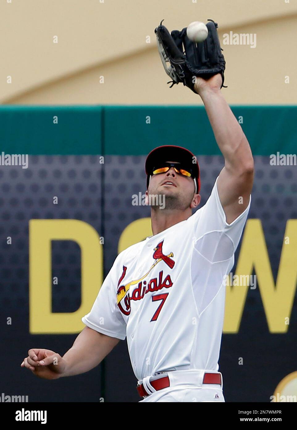 St. Louis Cardinals left fielder Matt Holliday catches a ball hit by
