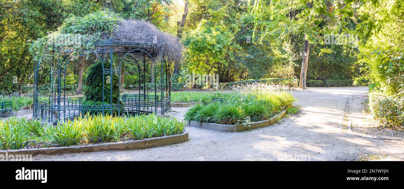 Three Roses Athens Landscape with rose pergola and water basin in National garden of ...
