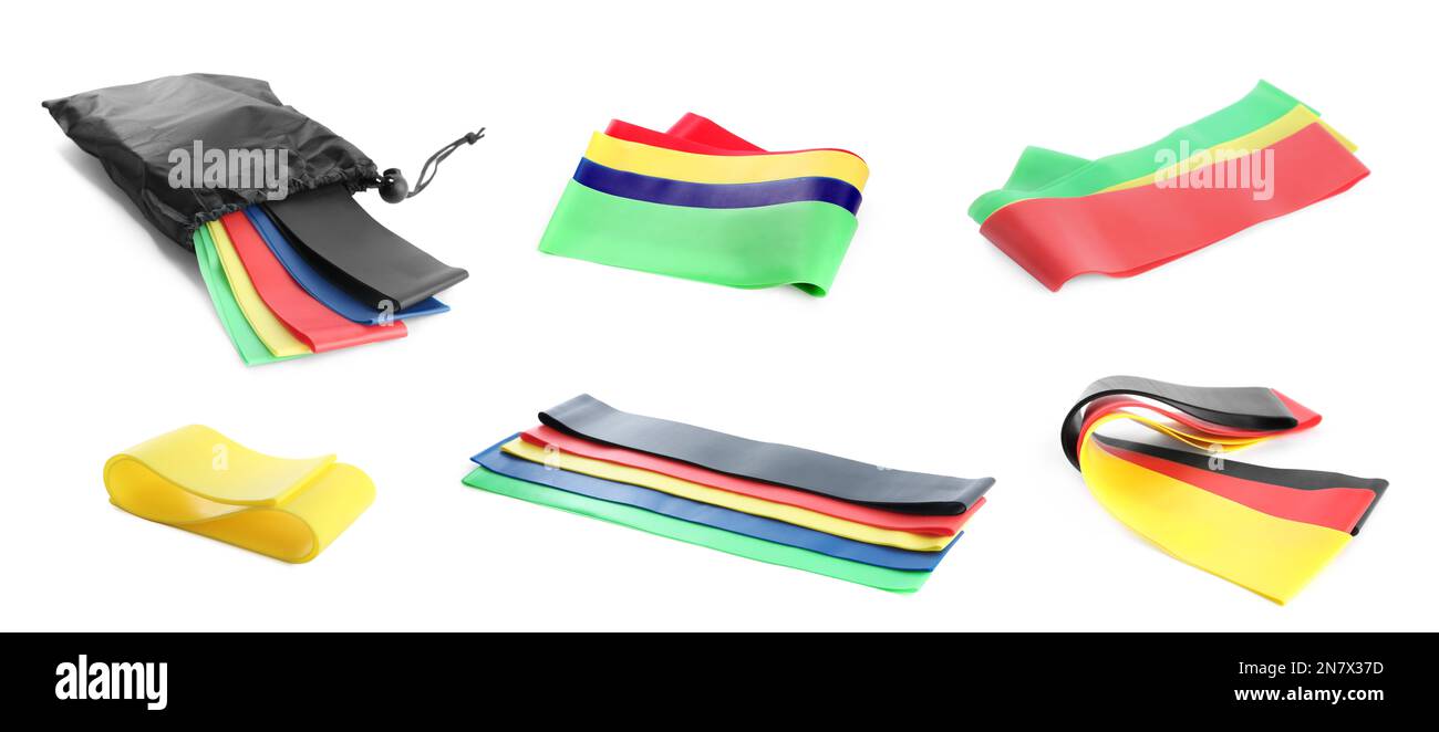 Set of different fitness elastic bands on white background, banner