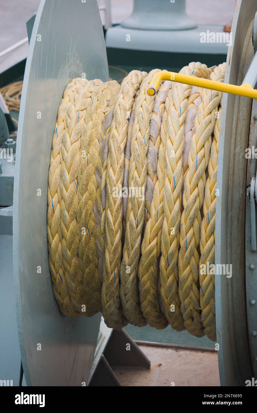 Reel of thick nautical rope on boat deck Stock Photo Alamy