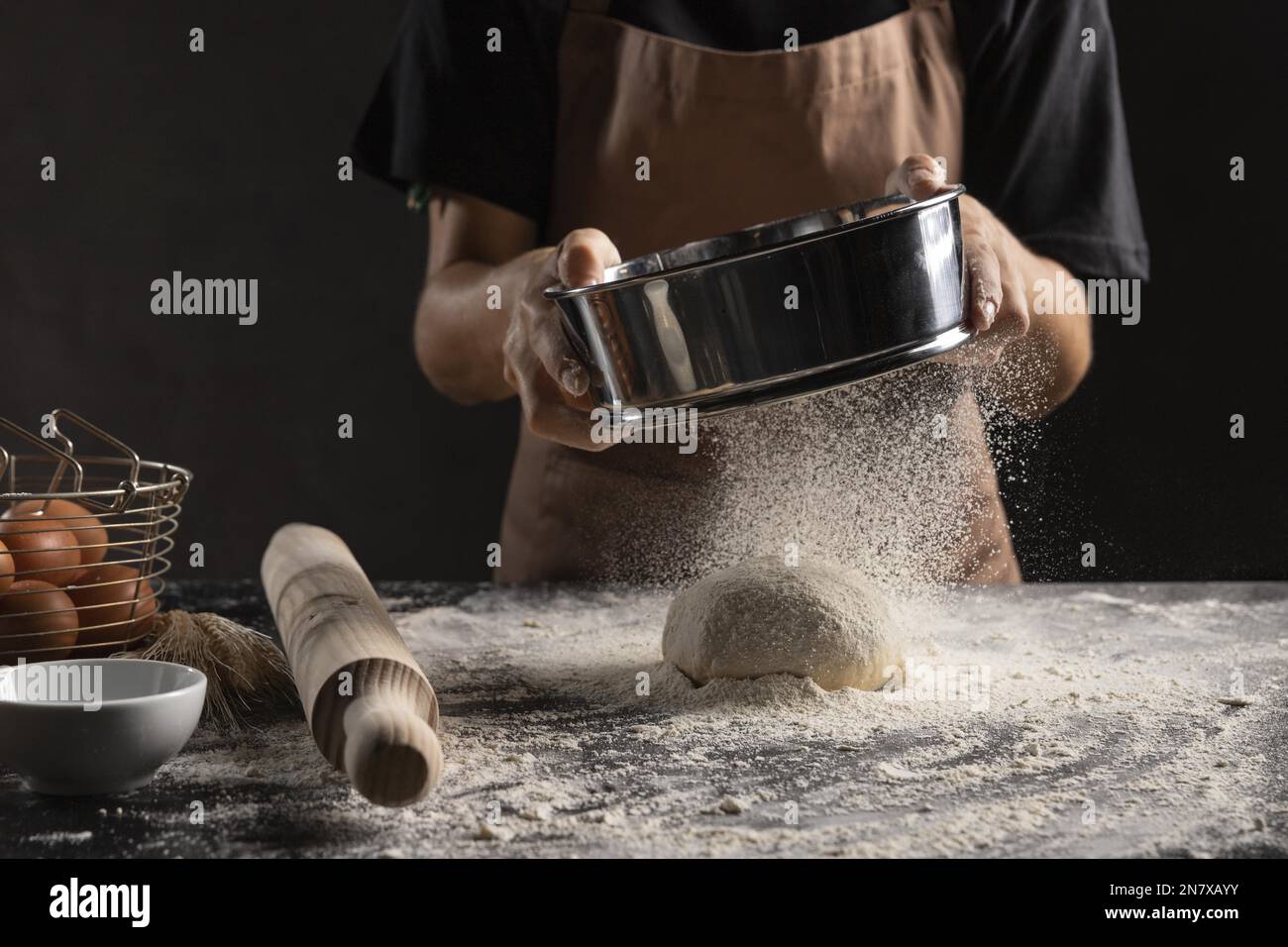 chef dusting flour dough Stock Photo Alamy