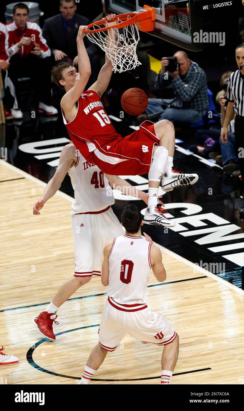 Wisconsin's Sam Dekker (15) dunks over Indiana's Cody Zeller during the second half of an NCAA