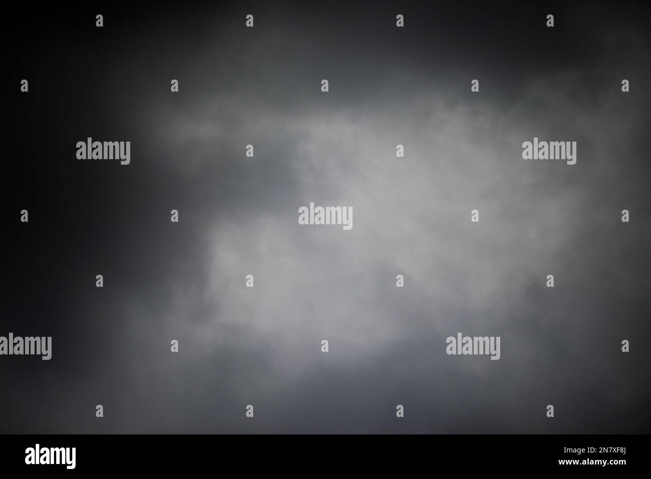 Dark black clouds in sky, Stormy rain clouds background Stock Photo - Alamy