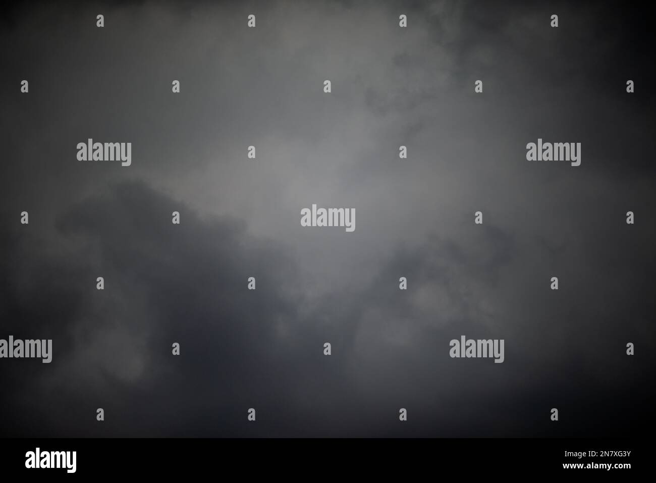 Dark black clouds in sky, Stormy rain clouds background Stock Photo - Alamy