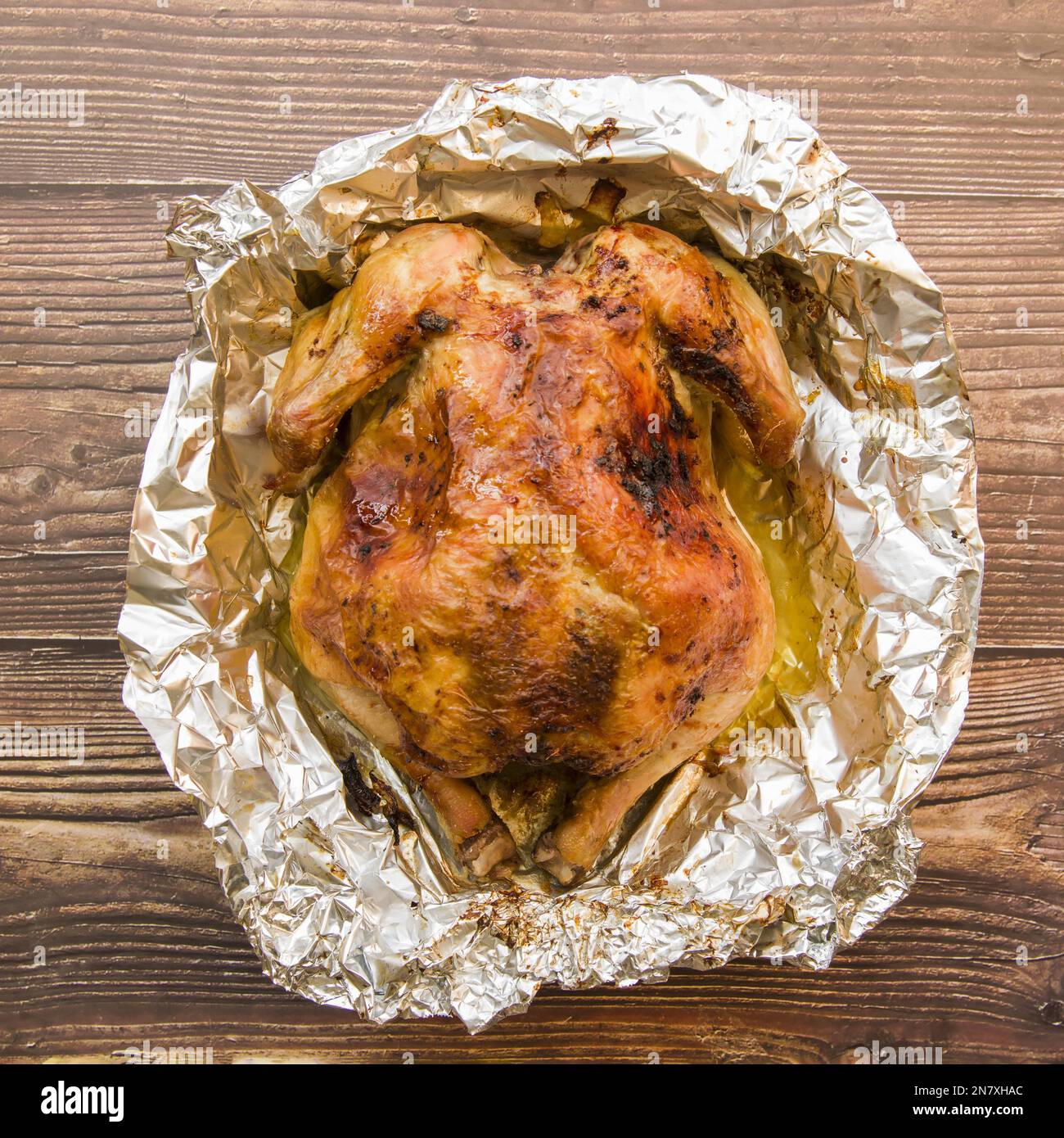 baked chicken foil Stock Photo Alamy