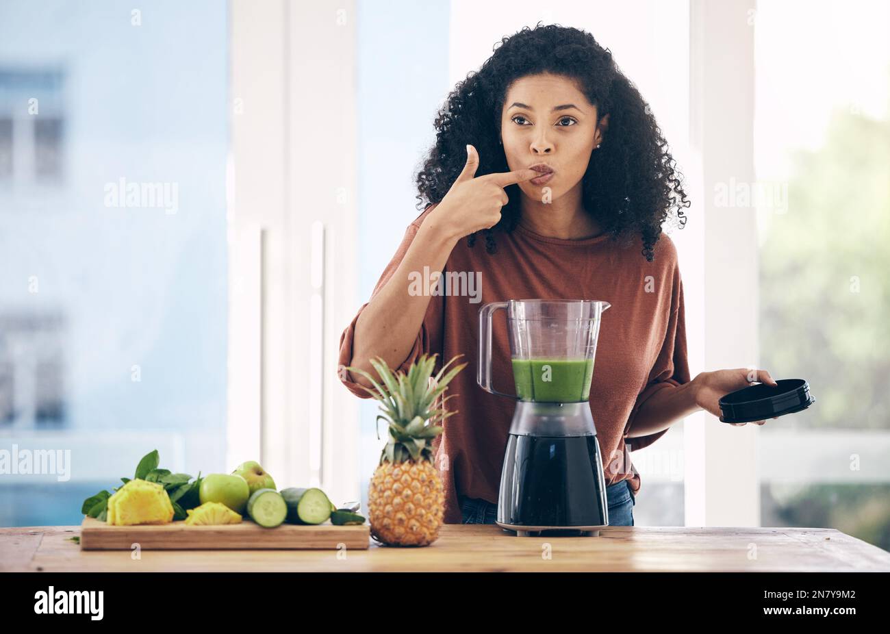 https://c8.alamy.com/comp/2N7Y9M2/blender-smoothie-and-healthy-black-woman-taste-juice-for-green-diet-detox-and-breakfast-fruits-in-kitchen-vegetables-food-and-person-or-2N7Y9M2.jpg