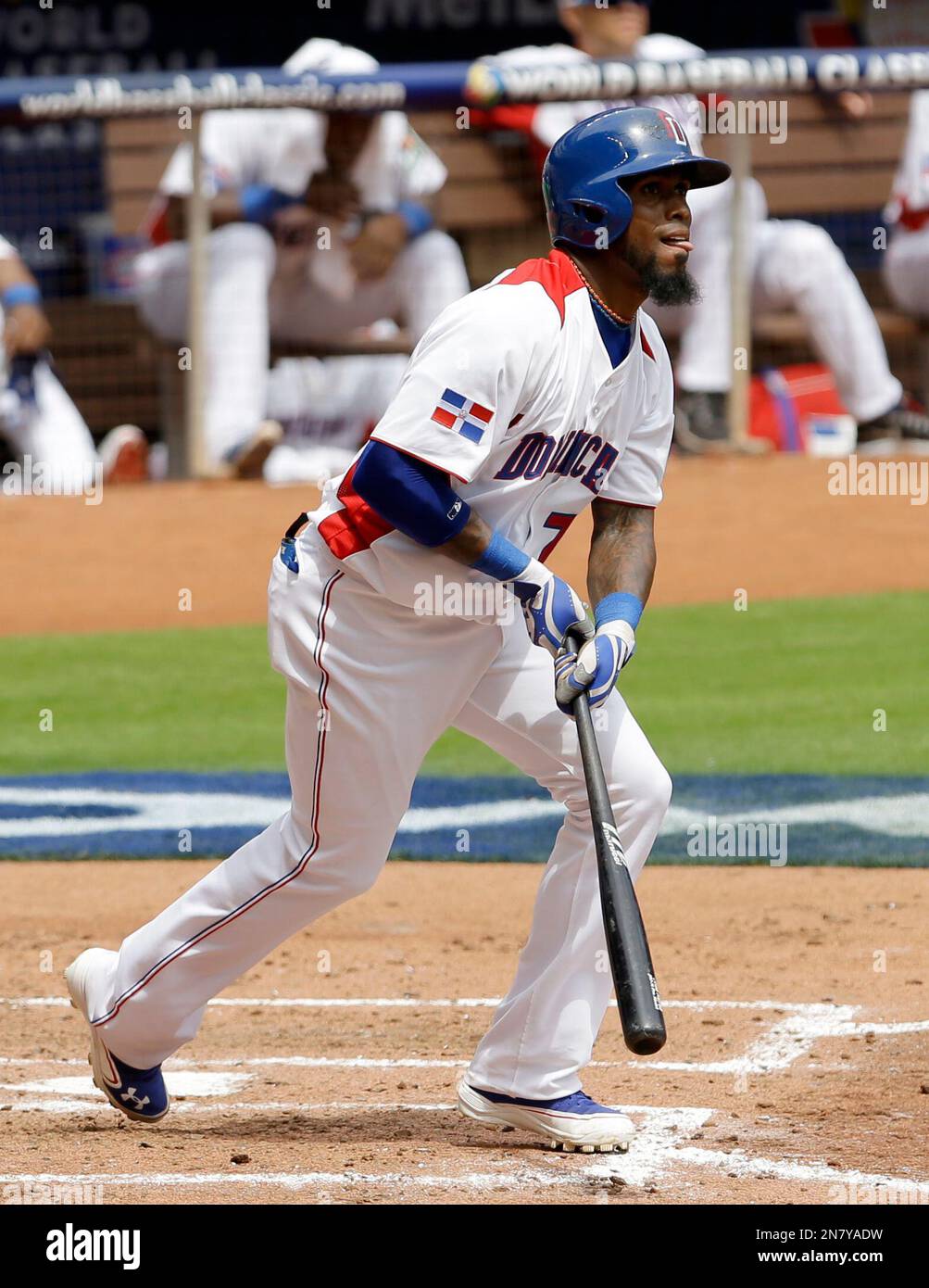 Dominican Republic's Jose Reyes watches his solo home run against Italy ...