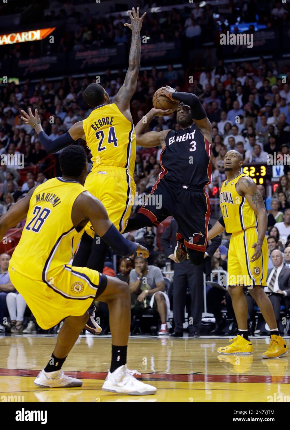 Miami Heat's Dwyane Wade (3) prepares to pass against Indiana Pacers