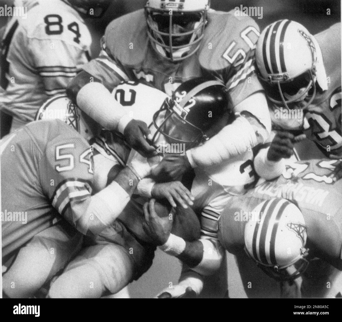 Houston Oilers Vernon Perry (32) and J. C. Wilson (33), do a