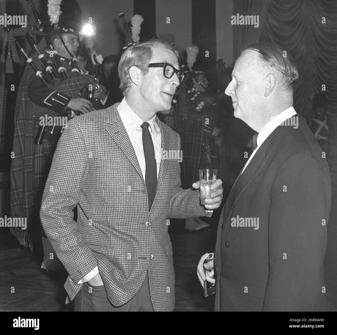 British actor Michael Caine talks with British Ambassador Sir Patrick ...
