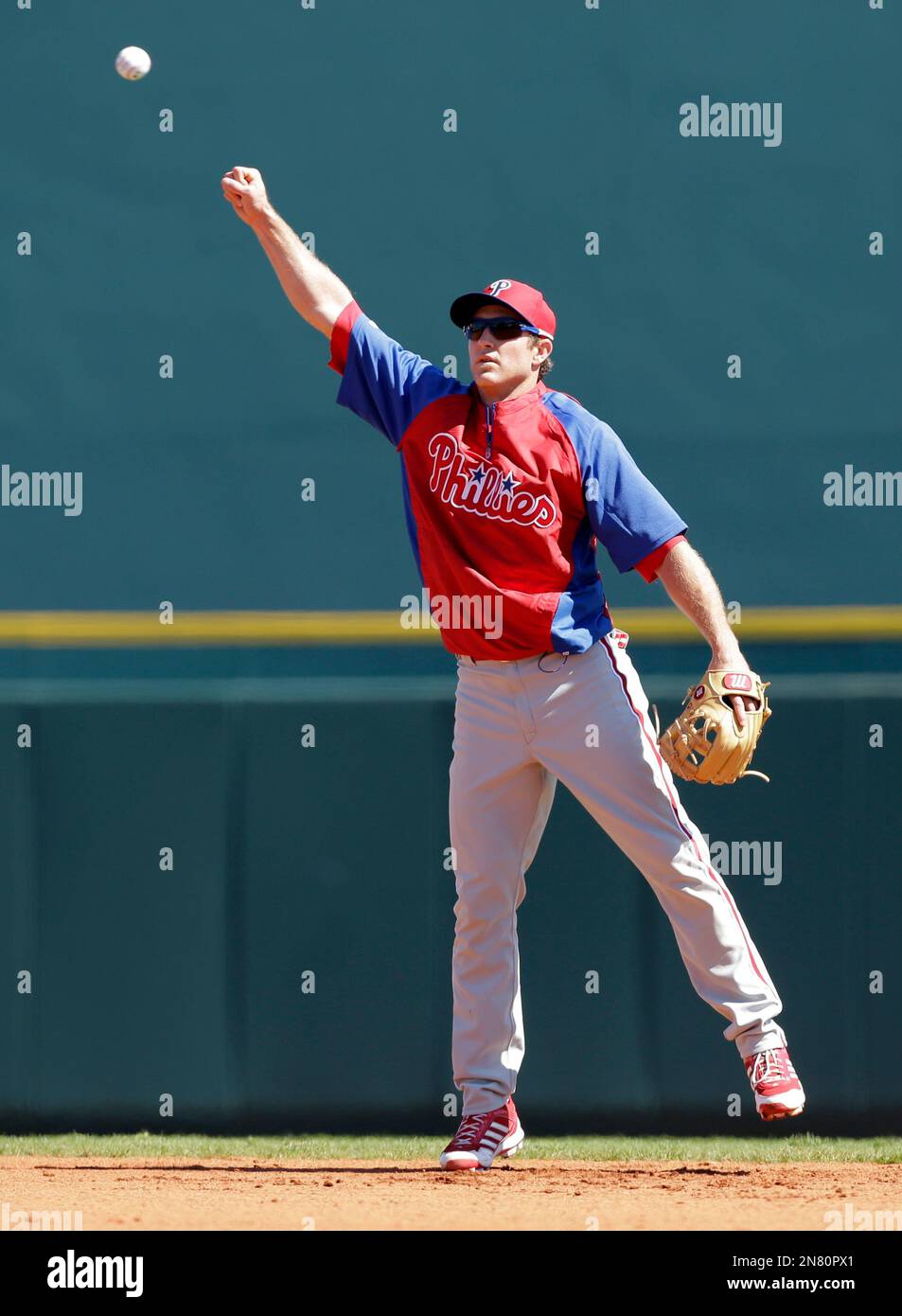 Philadelphia Phillies second baseman Chase Utley reaches for the ball