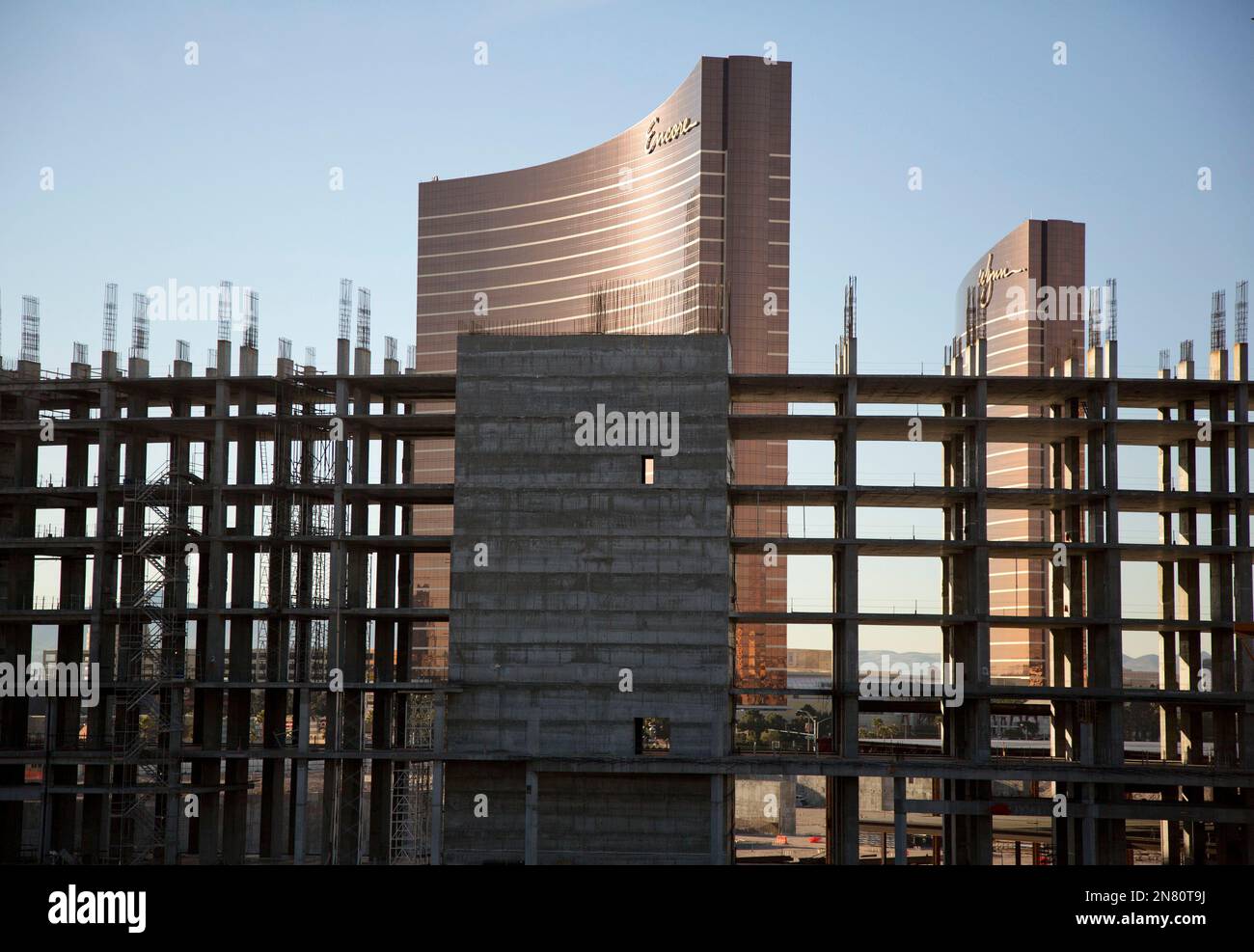 The Encore, left, and Wynn Hotel-Casinos are seen behind the skeleton ...