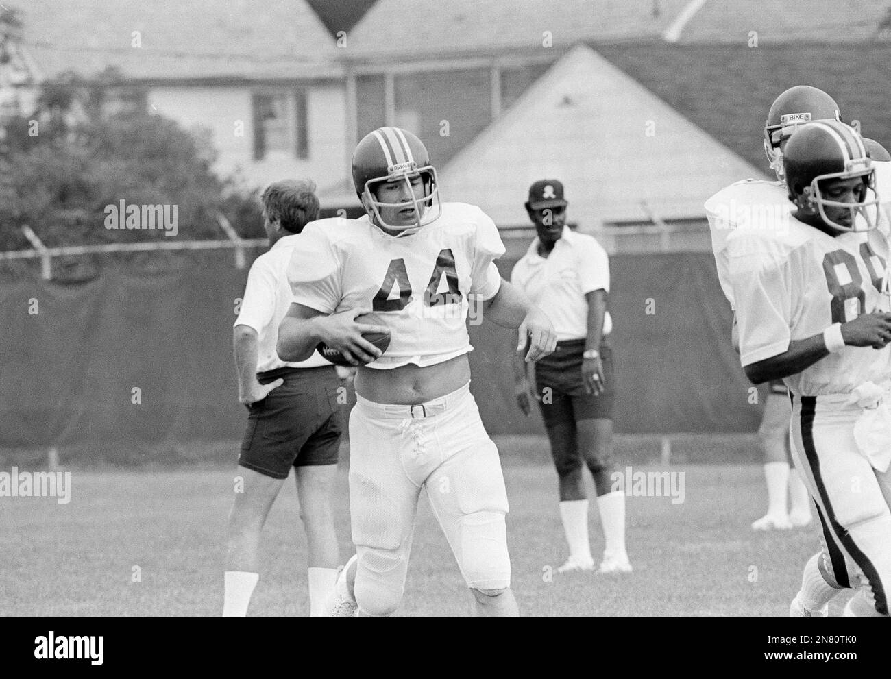 Washington Redskins running back John Riggins (44) carries the ball during  early workout after Riggins arrived at the Redskins training camp in  Carlisle, Pa., for practice, July 21, 1981. (AP Photo/Paul Vathis
