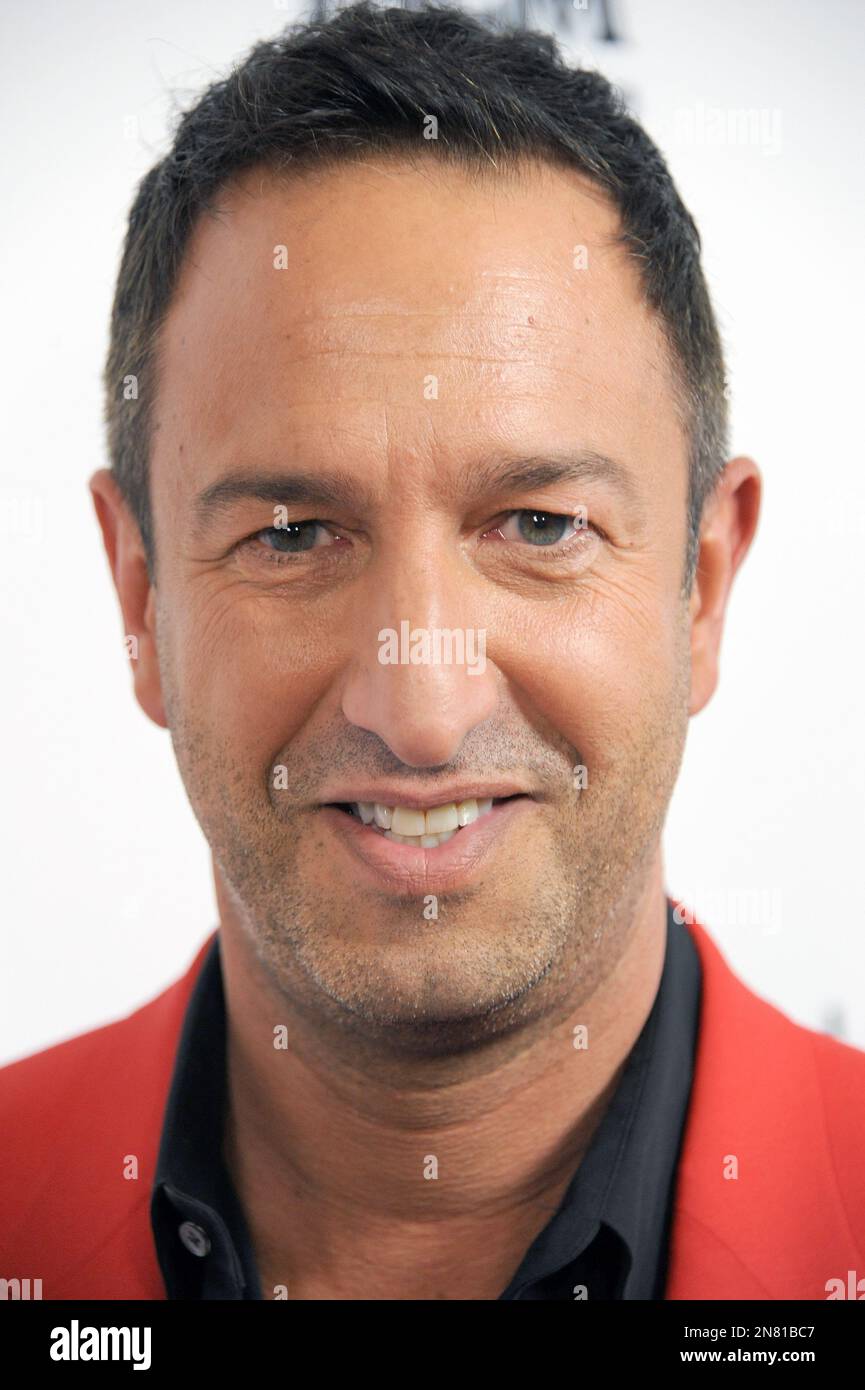 Christos Garkinos arrives at Harper’s BAZAAR celebration of the launch