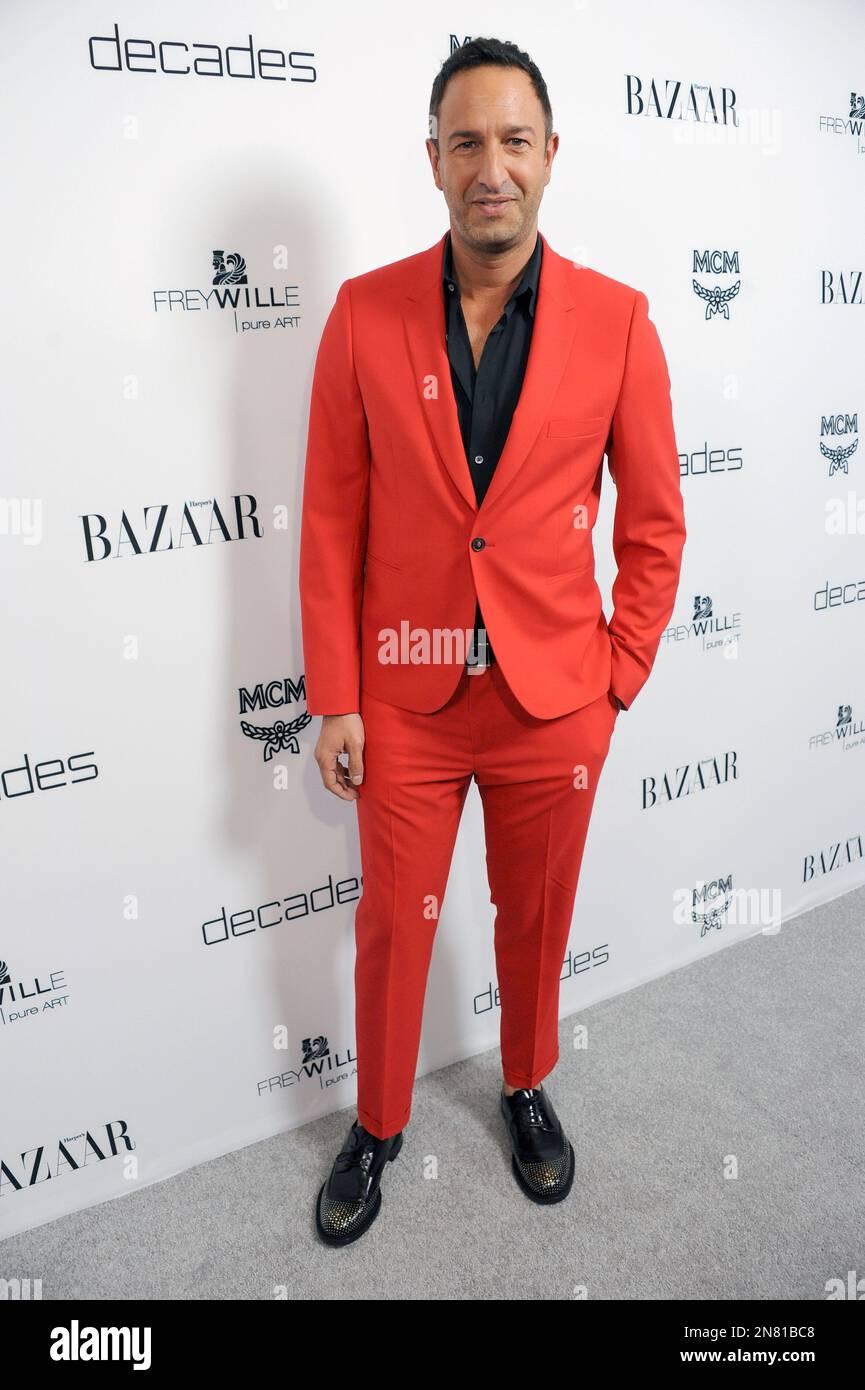 Christos Garkinos arrives at Harper’s BAZAAR celebration of the launch