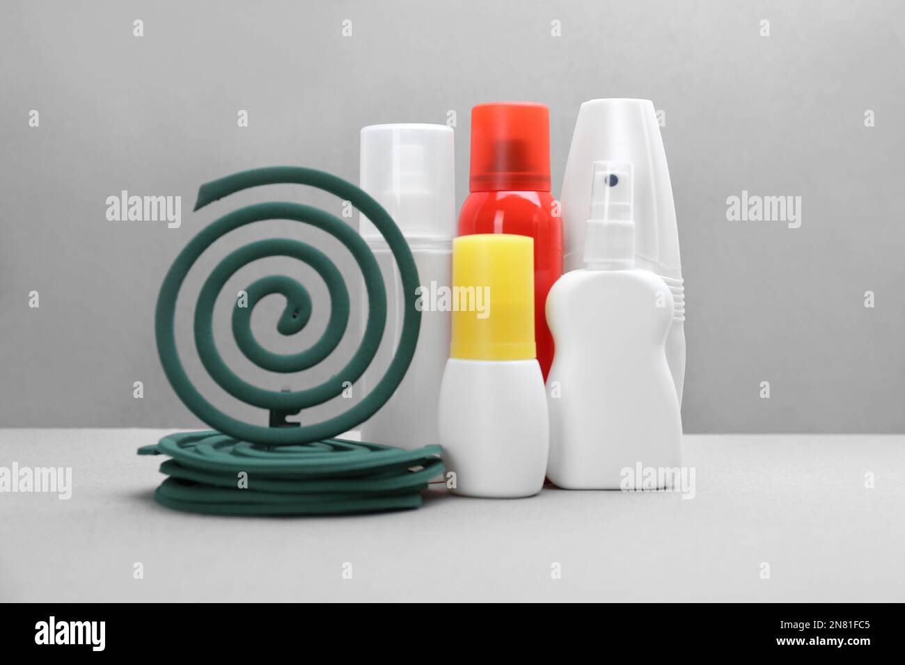 Sample Insect Repellants Set of different insect repellents on grey background Stock Photo - Alamy