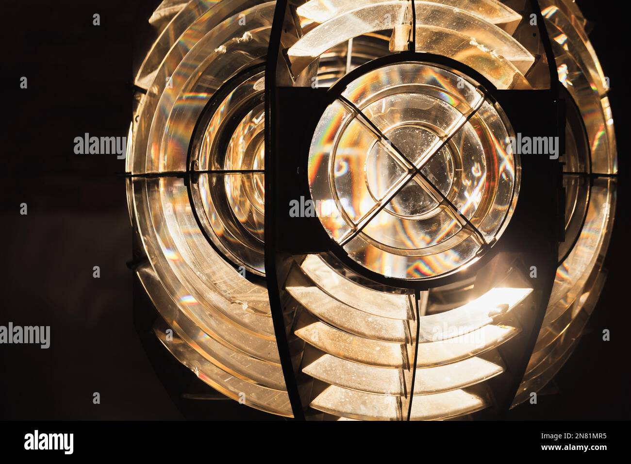 Close up photo.of a ;ighthouse lamp with a Fresnel lens. It is a type of composite compact lens developed by the French physicist Augustin-Jean Fresne Stock Photo
