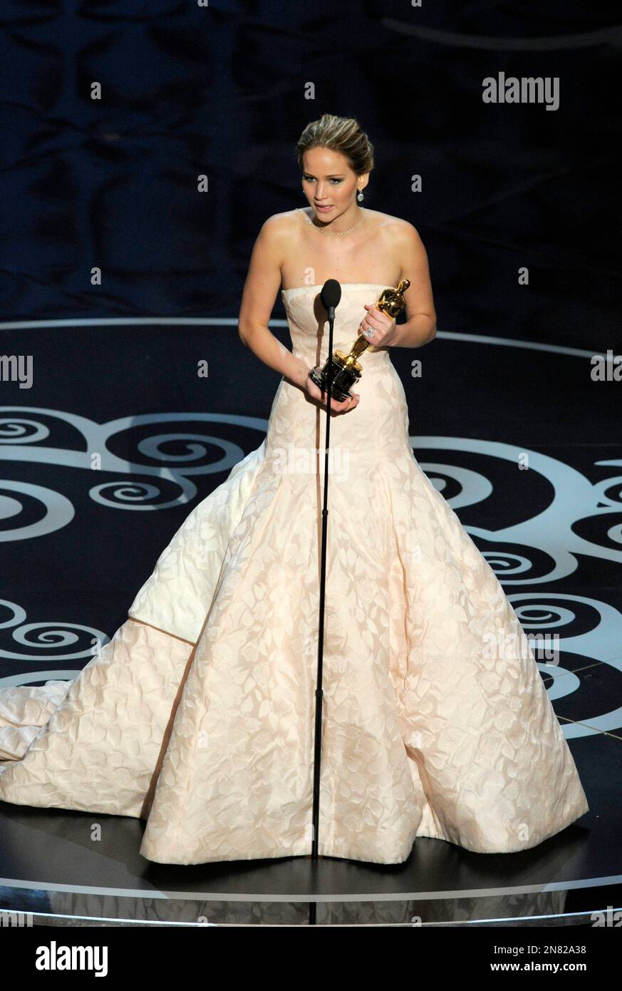 Jennifer Lawrence accepts the award for best actress in a leading role