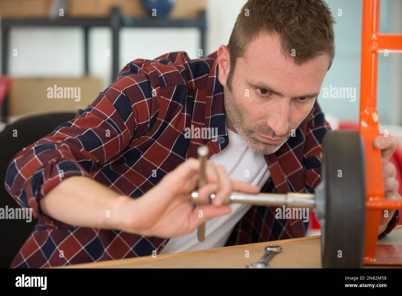 Installing something hi-res stock photography and images - Alamy