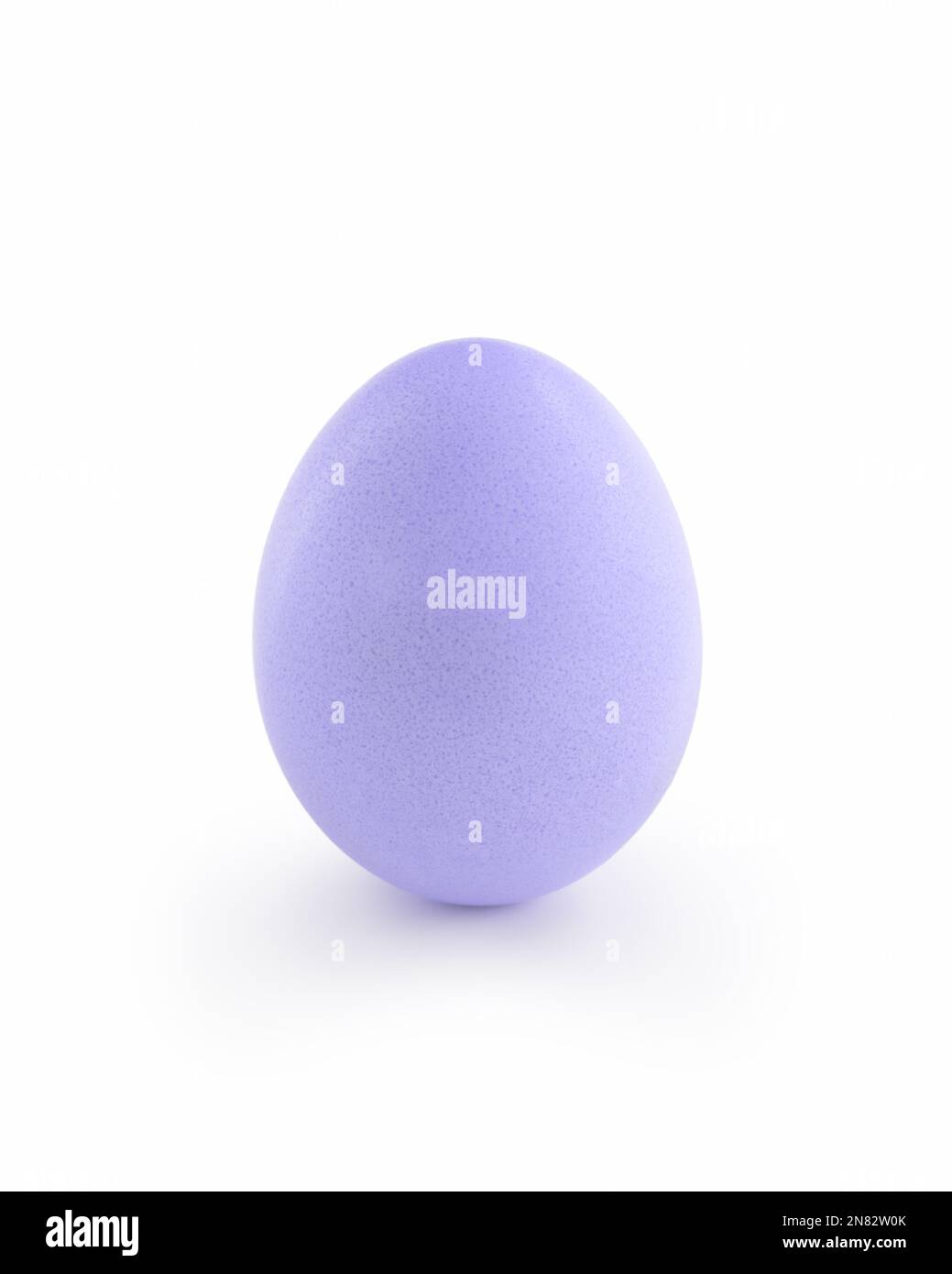 violet easter egg isolated on white background, with shadow Stock Photo