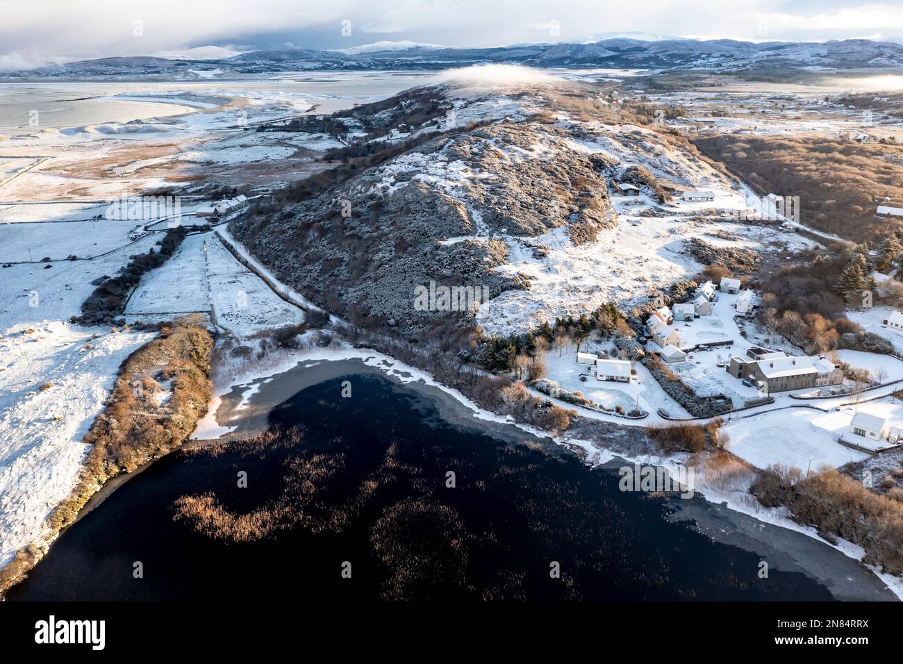 Aerial view of snow covered Cashelgoland by Portnoo in County Donegal, Ireland Stock Photo