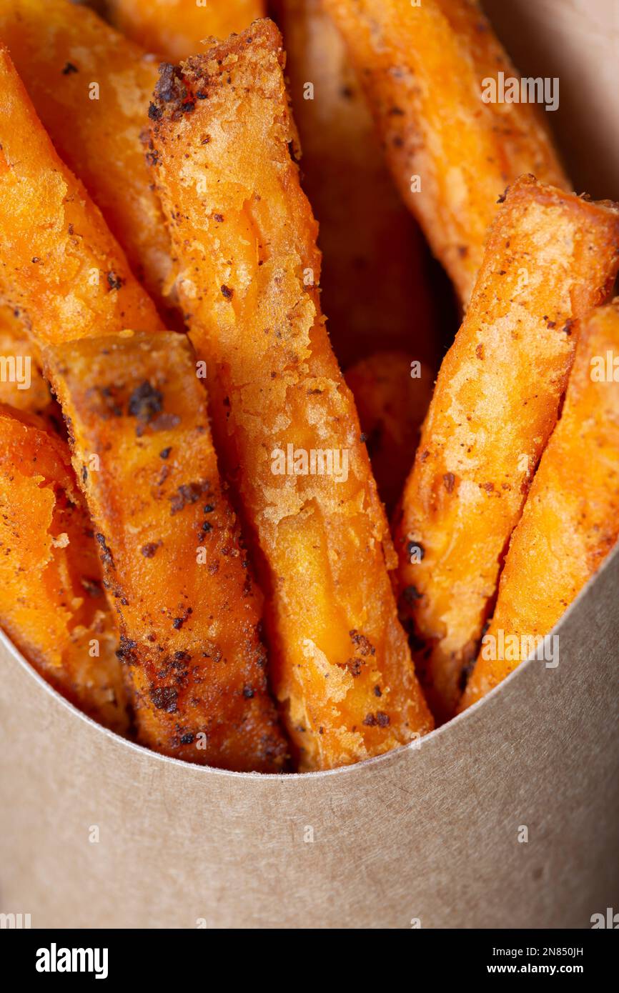Sweet potato fries in a takeaway card container box. Disposable recycling  sustainable plastic free takeaway packaging Stock Photo - Alamy