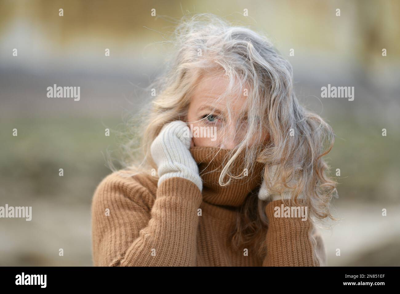 Portrait of a sixty-year-old woman with a gray hair Stock Photo