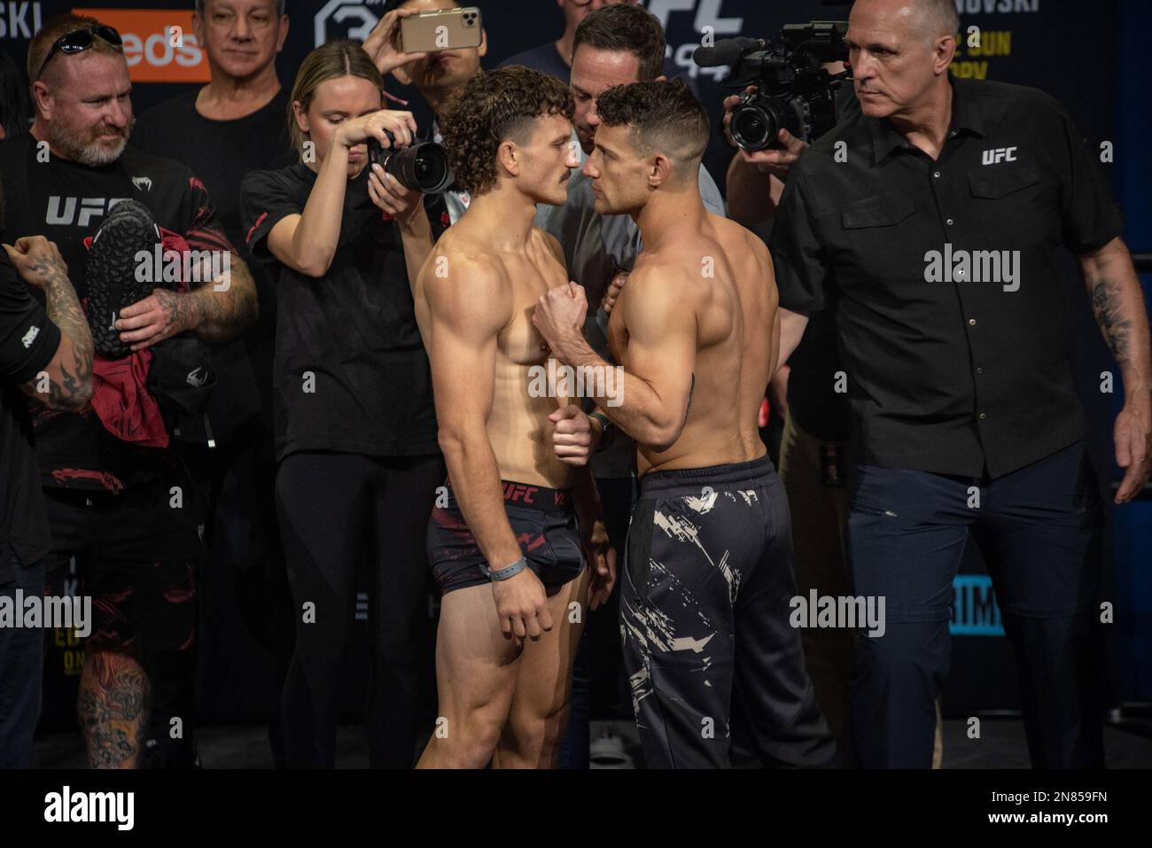 PERTH, AUSTRALIA - FEBRUARY 11: Jack Jenkins and Don Shianis face off at the UFC 284 weigh ins ahead of their fight at UFC 284: Makhachev v Volkanovski at Rac Arena on February 12th, 2023 in Perth, Western Australia, Australia. (Photo by Matt Davies/PxImages) Credit: Px Images/Alamy Live News Stock Photo