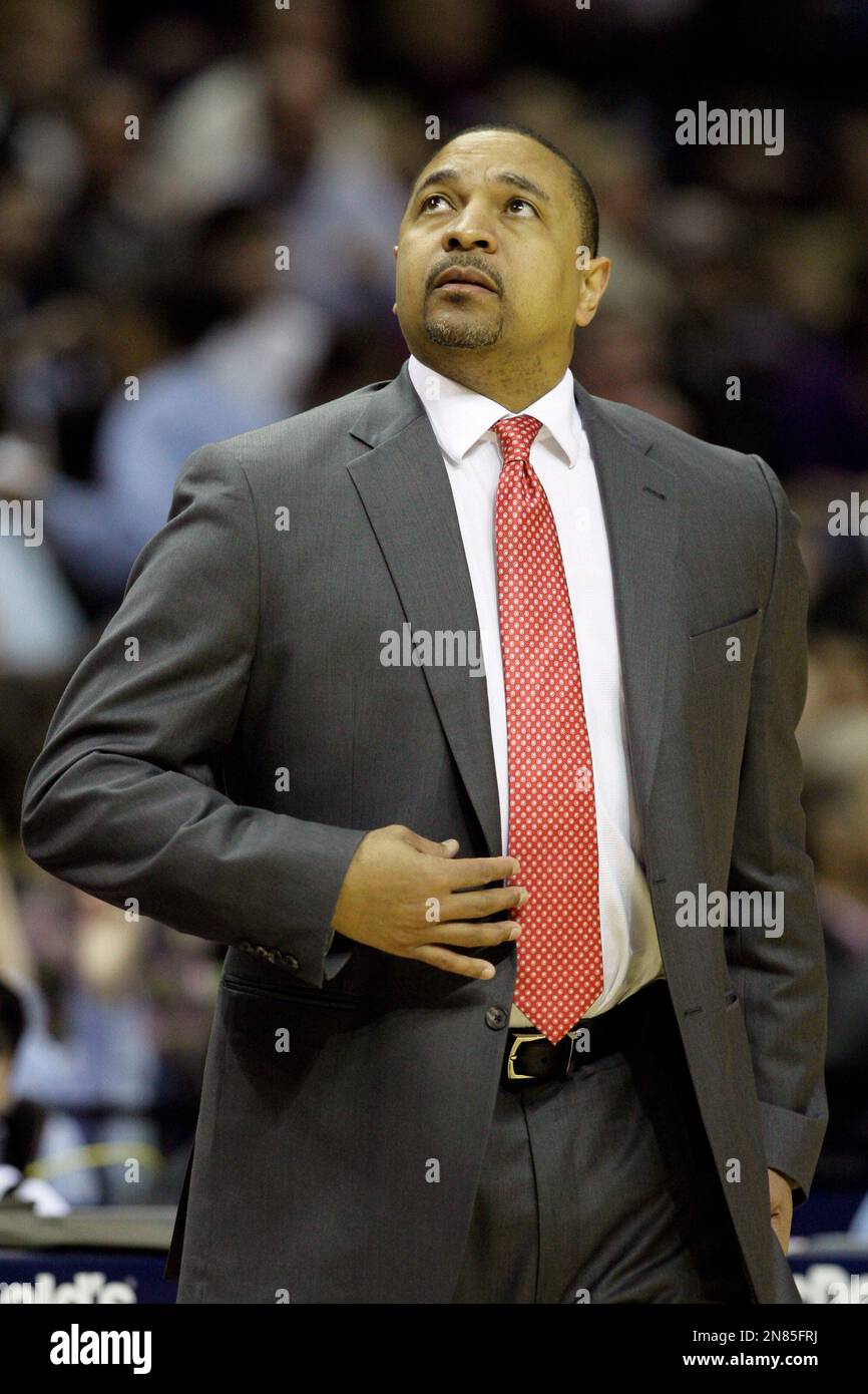 Golden State Warriors coach Mark Jackson watches the first half of an NBA basketball game