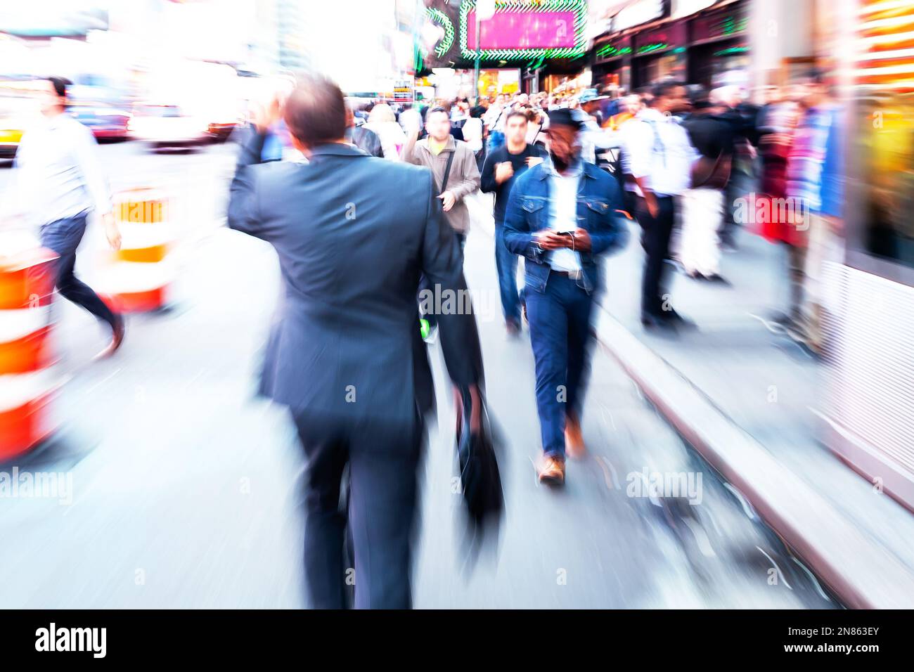 crowd of people walking on a sidewalkin in NYC, with camera made motion ...