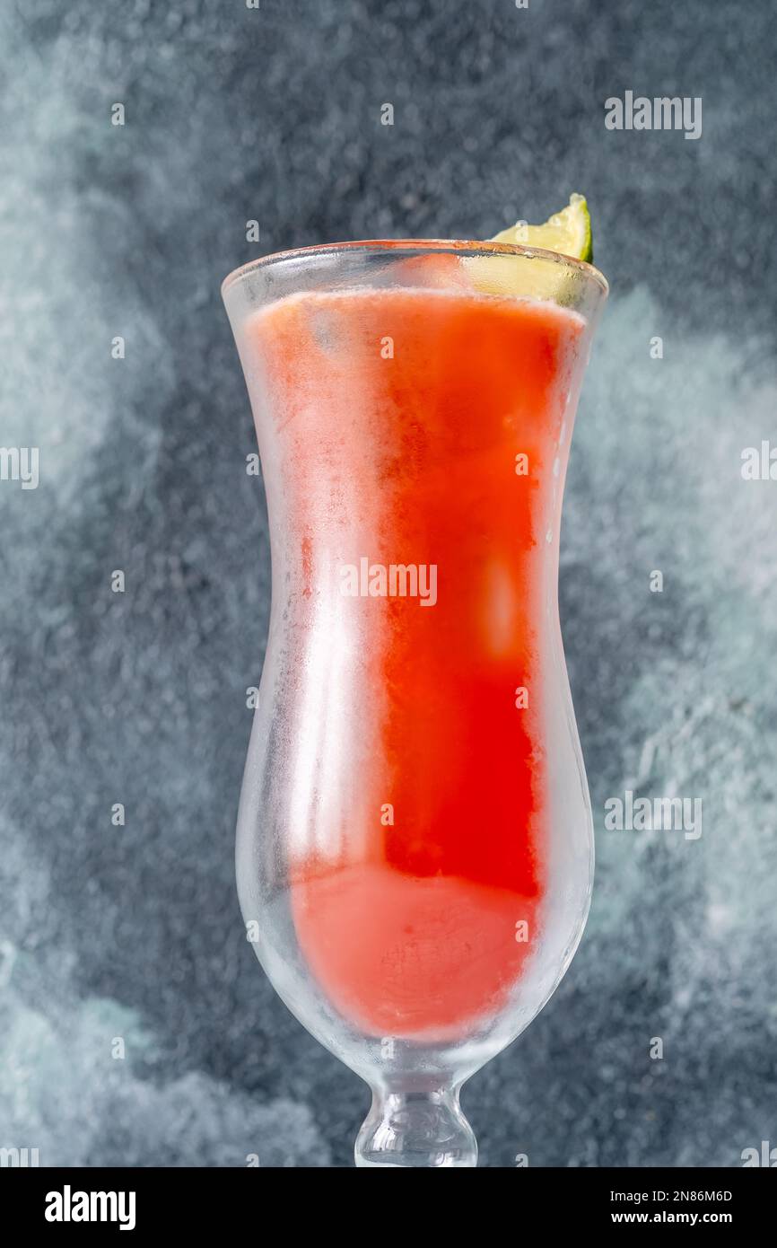 https://c8.alamy.com/comp/2N86M6D/glass-of-koolaid-cocktail-garnished-with-lime-wedge-2N86M6D.jpg