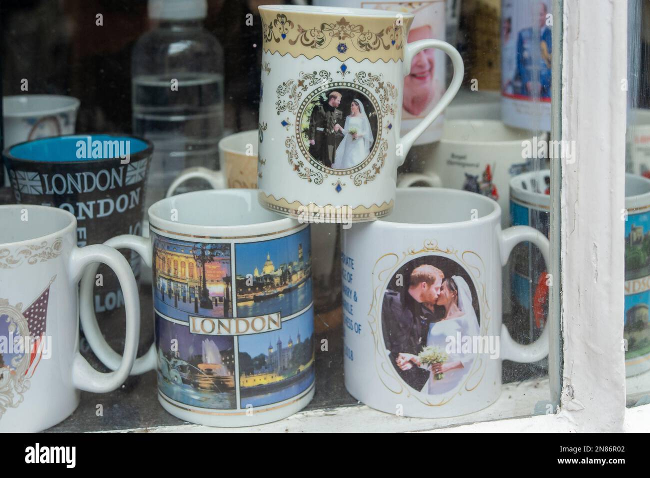 Windsor, Berkshire, UK. 11th February, 2023. Harry and Meghan tourist gifts for sale in Windsor. Despite the critical book Spare about Prince Harry and his life as a Royal, it has been widely reported in the press today that Meghan and Harry are to be invited to the Coronation of King Charles III taking place this May. Credit: Maureen McLean/Alamy Live News Stock Photo