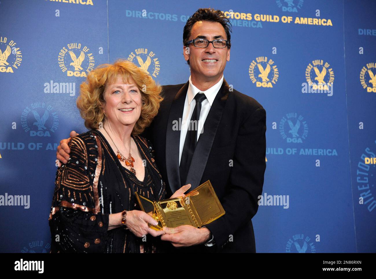 Frank Capra III, right, poses backstage with Susan Zwerman and her