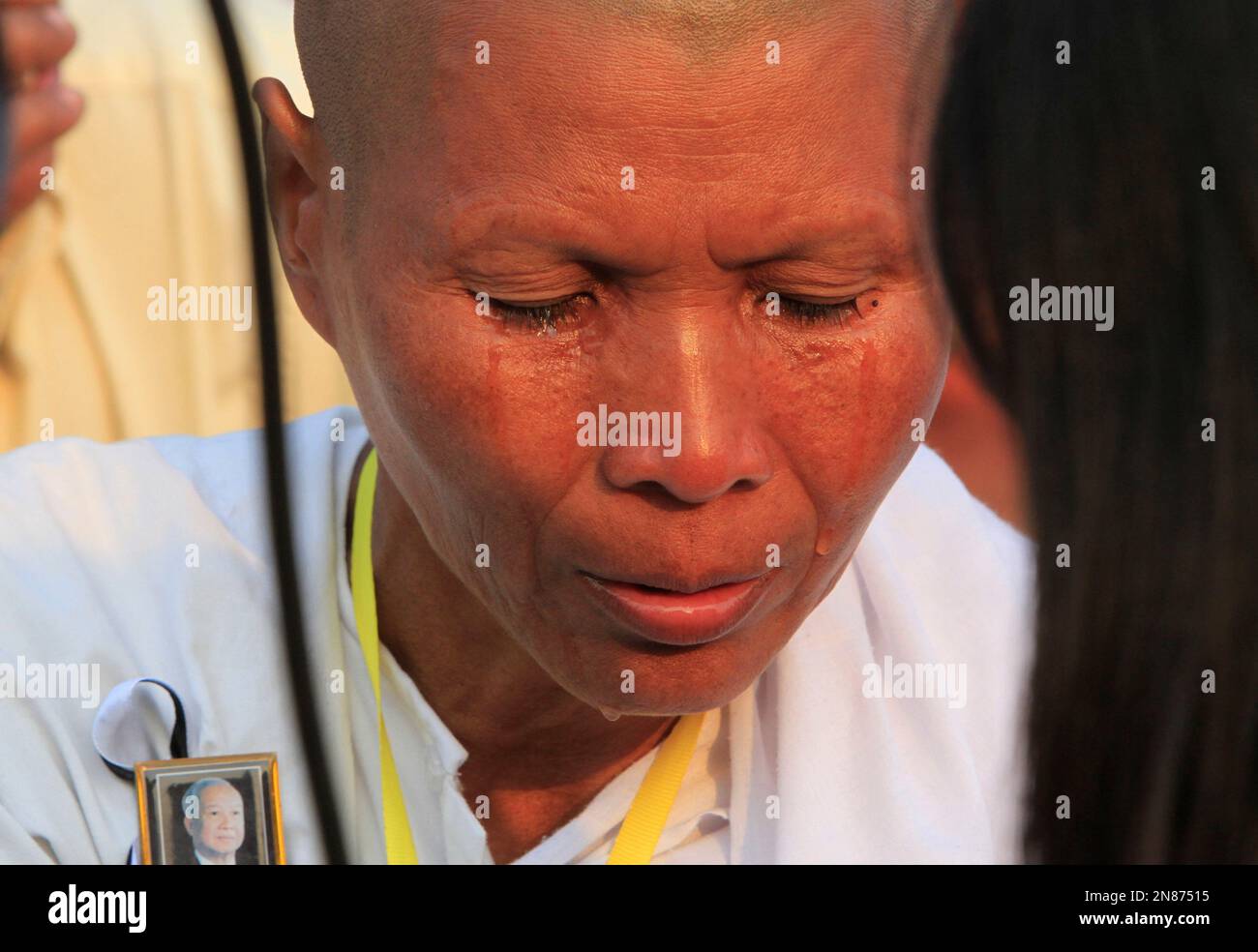 A Mourner Cries During The Funeral Procession For Cambodia's Late ...