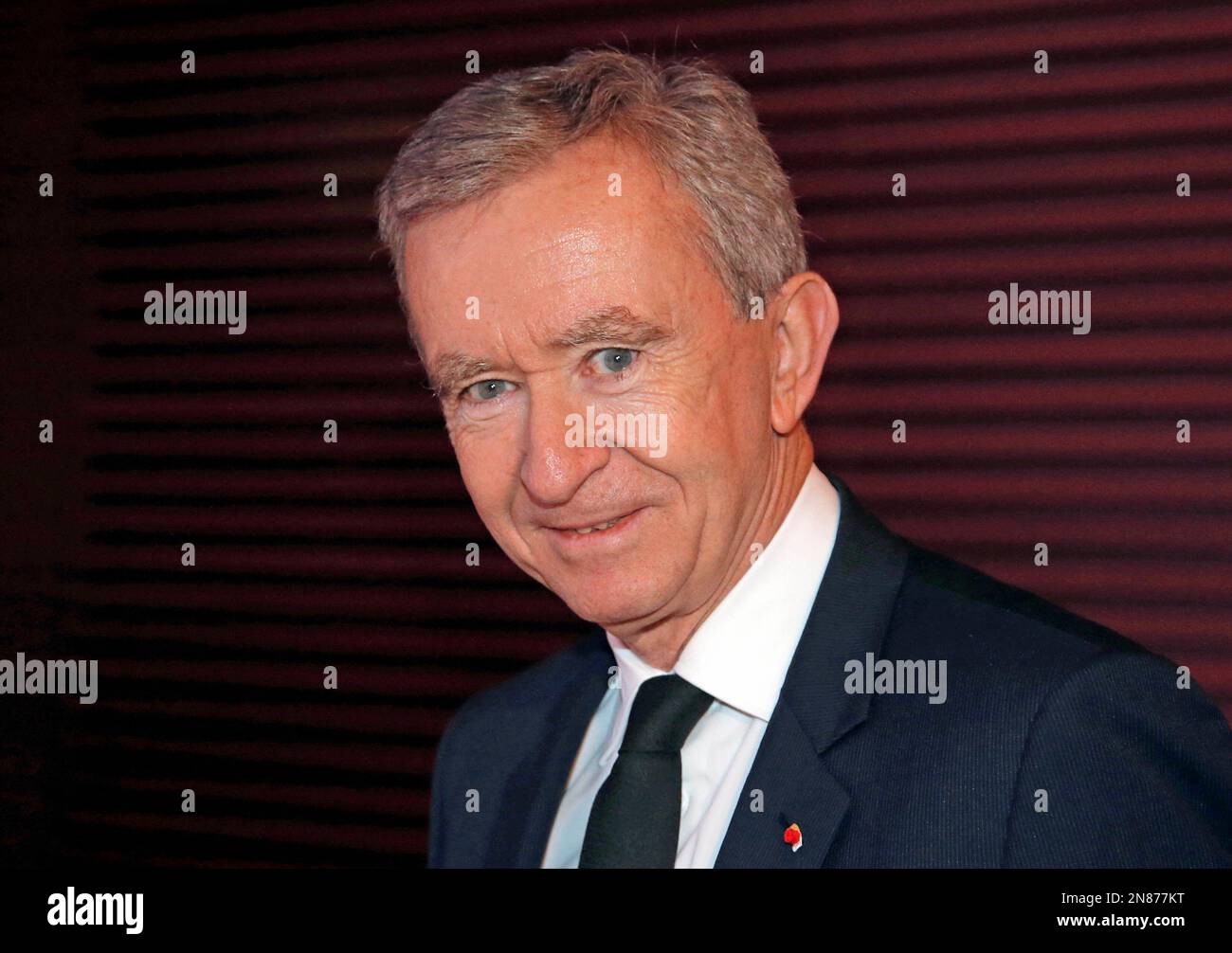 Bernard Arnault (L3), CEO of Moet Hennessy Louis Vuitton (MHLV) and Casino  tycoon Stanley Ho (L2) look at scale models of the LAvenue Shanghai during  Stock Photo - Alamy