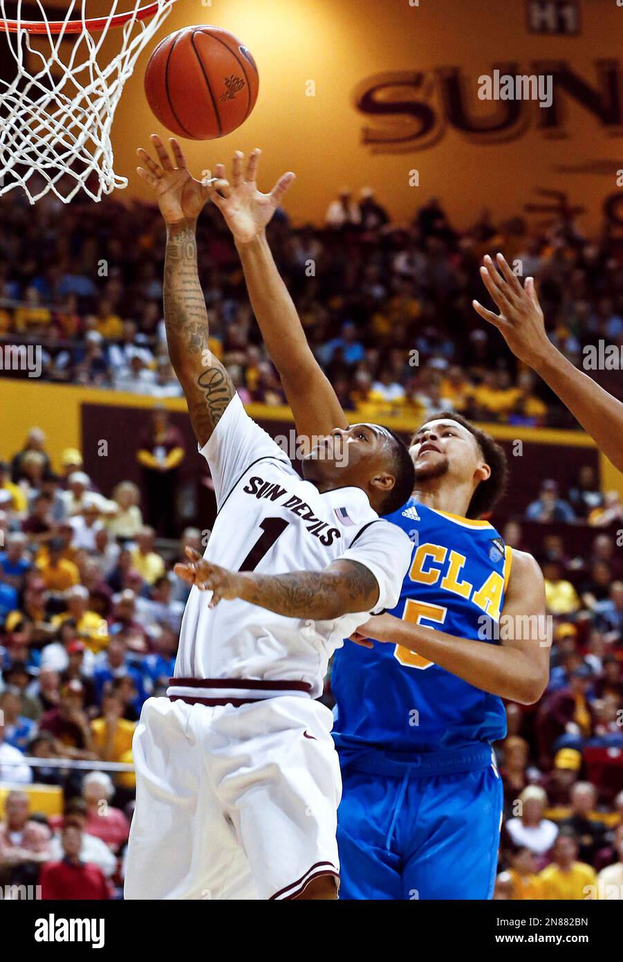 Arizona State's Jahii Carson (1) shoots against UCLA's Kyle Anderson