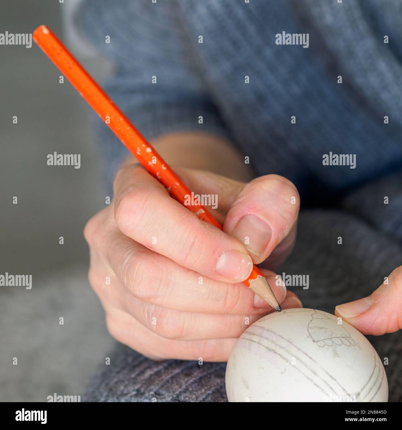 Decorating an Easter egg. Needlework. Traditional Easter customs in Poland. Stock Photo
