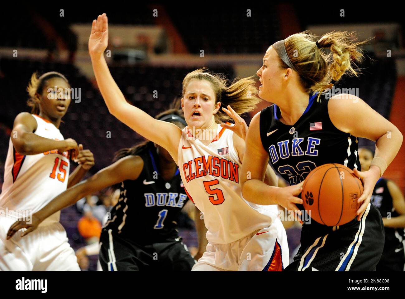 Duke's Tricia Liston, right, drives through the baseline while being ...
