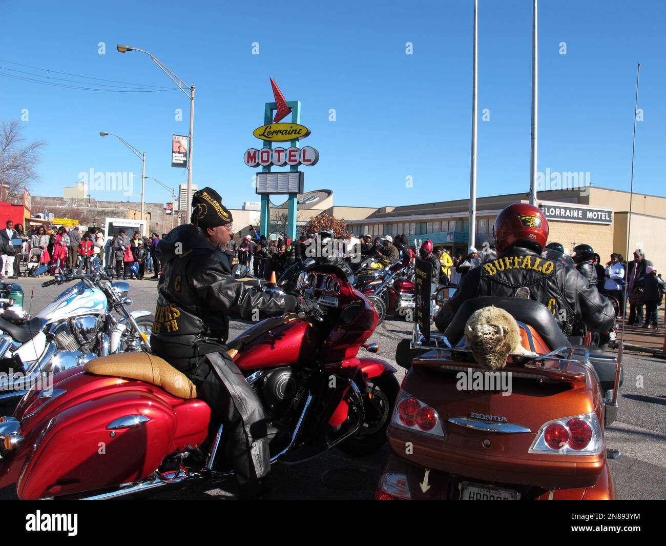 Members of the Buffalo Soldiers motorcycle club park their bikes