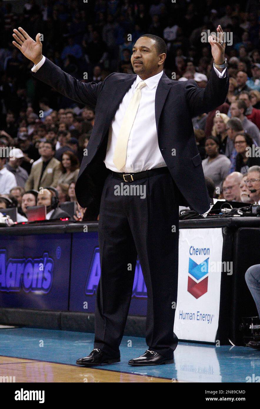 Golden State Warriors coach Mark Jackson celebrates during the second half of an NBA basketball