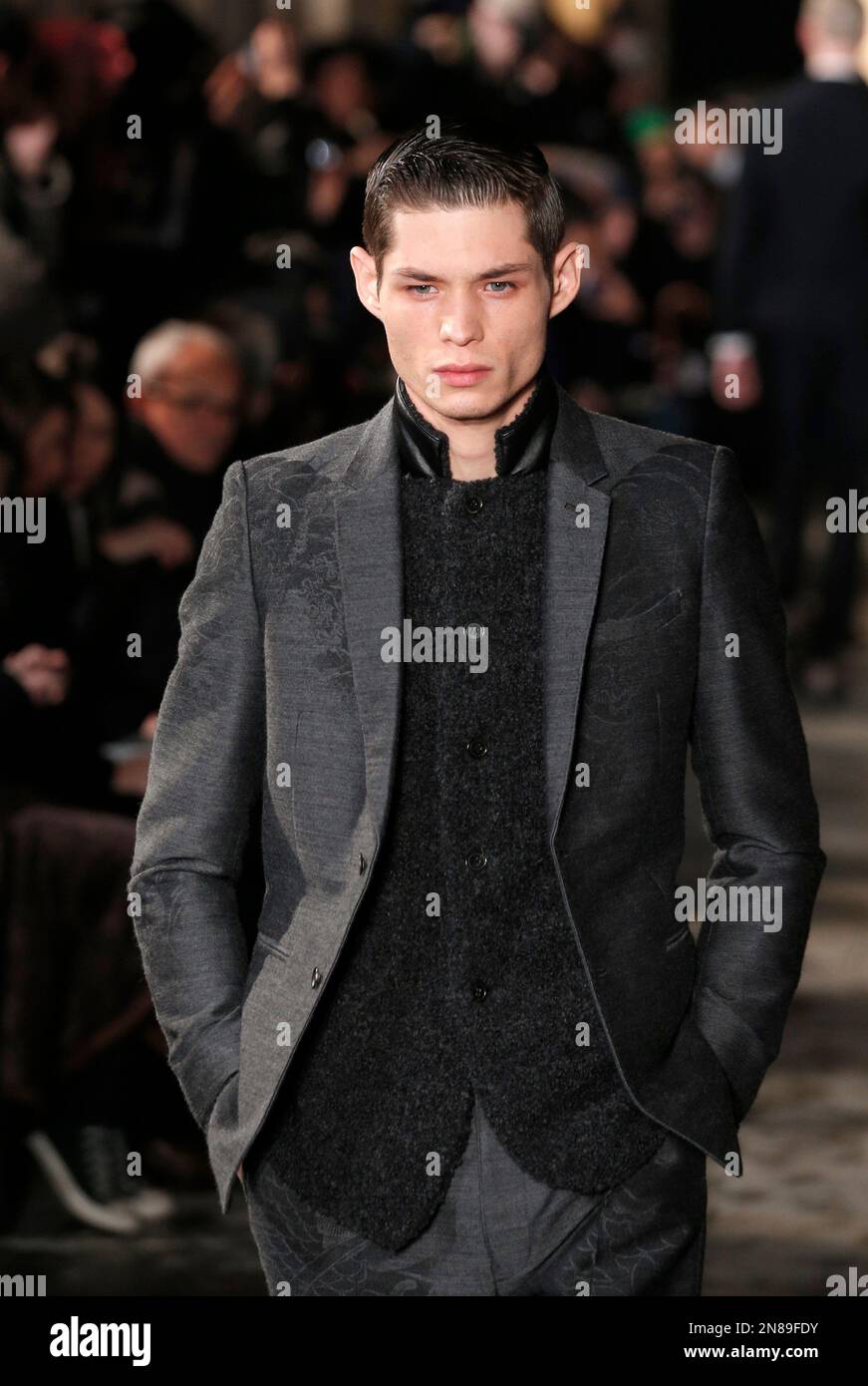A model wears a creation by Japanese fashion designer Mihara Yasuhiro for  his fall-winter 2013/2014 men's fashion collection, presented in Paris,  Saturday, Jan. 19, 2013. (AP Photo/Christophe Ena Stock Photo - Alamy, image size:871x1390