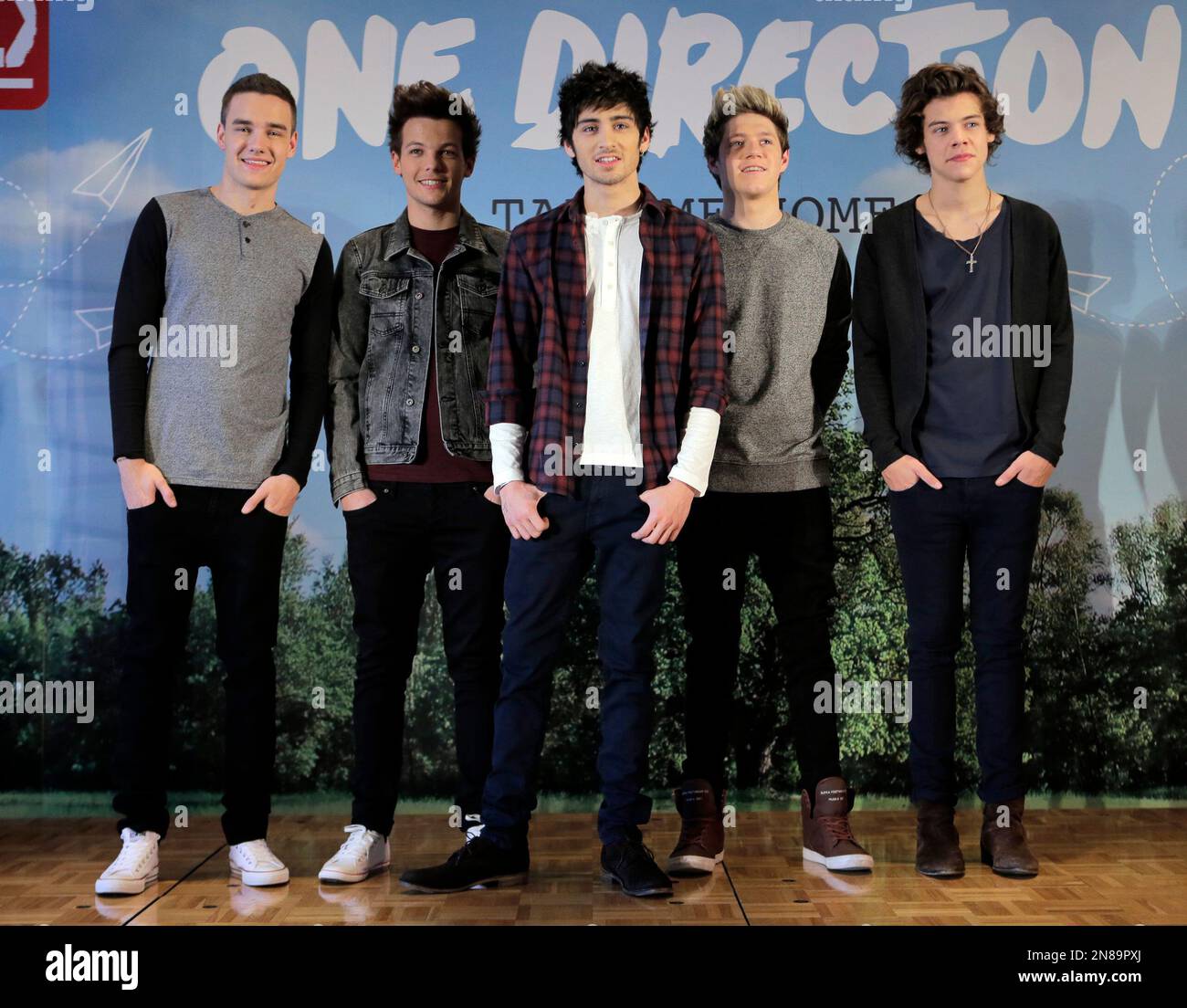 British boy band One Direction members pose for photographers, from ...