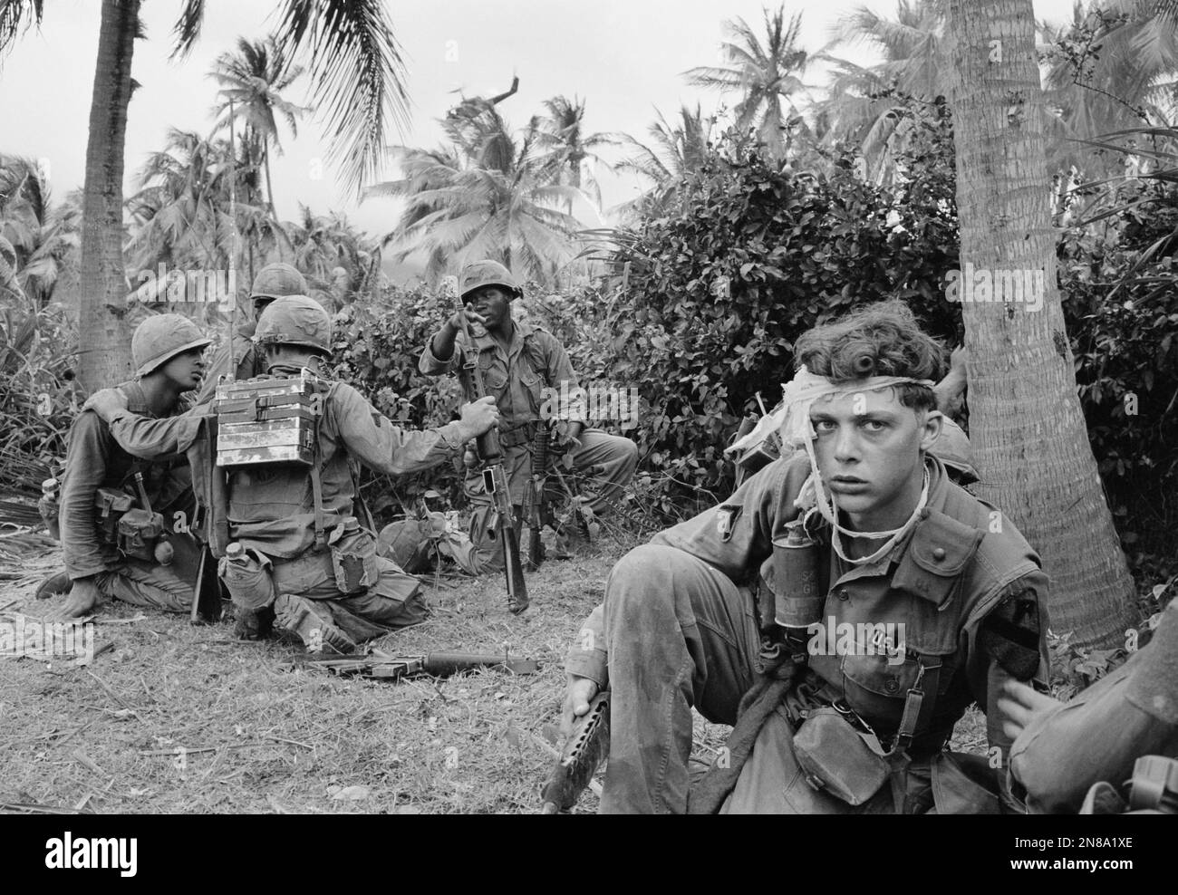 Pfc. Michael Row of Hyattsville, Md., a medic wounded by a grazing ...