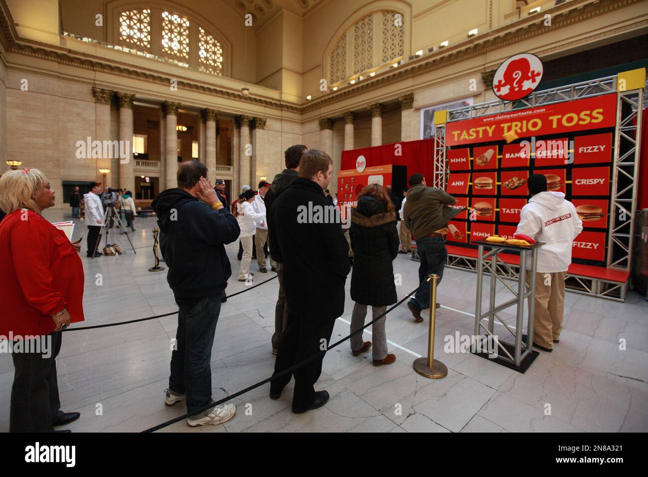 IMAGE DISTRIBUTED FOR WENDYS Members of the public line up to play