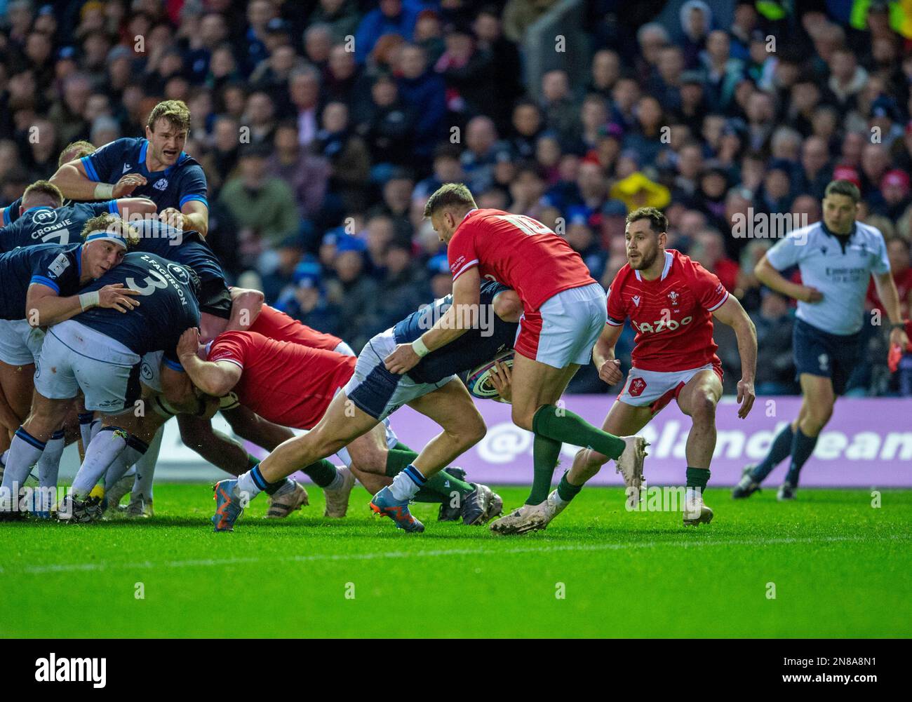 11th February 2023: Guinness Six Nations 2023. ScotlandÕs George Turner crosses the line to score a try with Wales Dan Biggar trying to tackle him during the Scotland v Wales, Guinness Six Nations match at BT Murrayfield,  Edinburgh. Credit: Ian Rutherford Alamy Live News Stock Photo