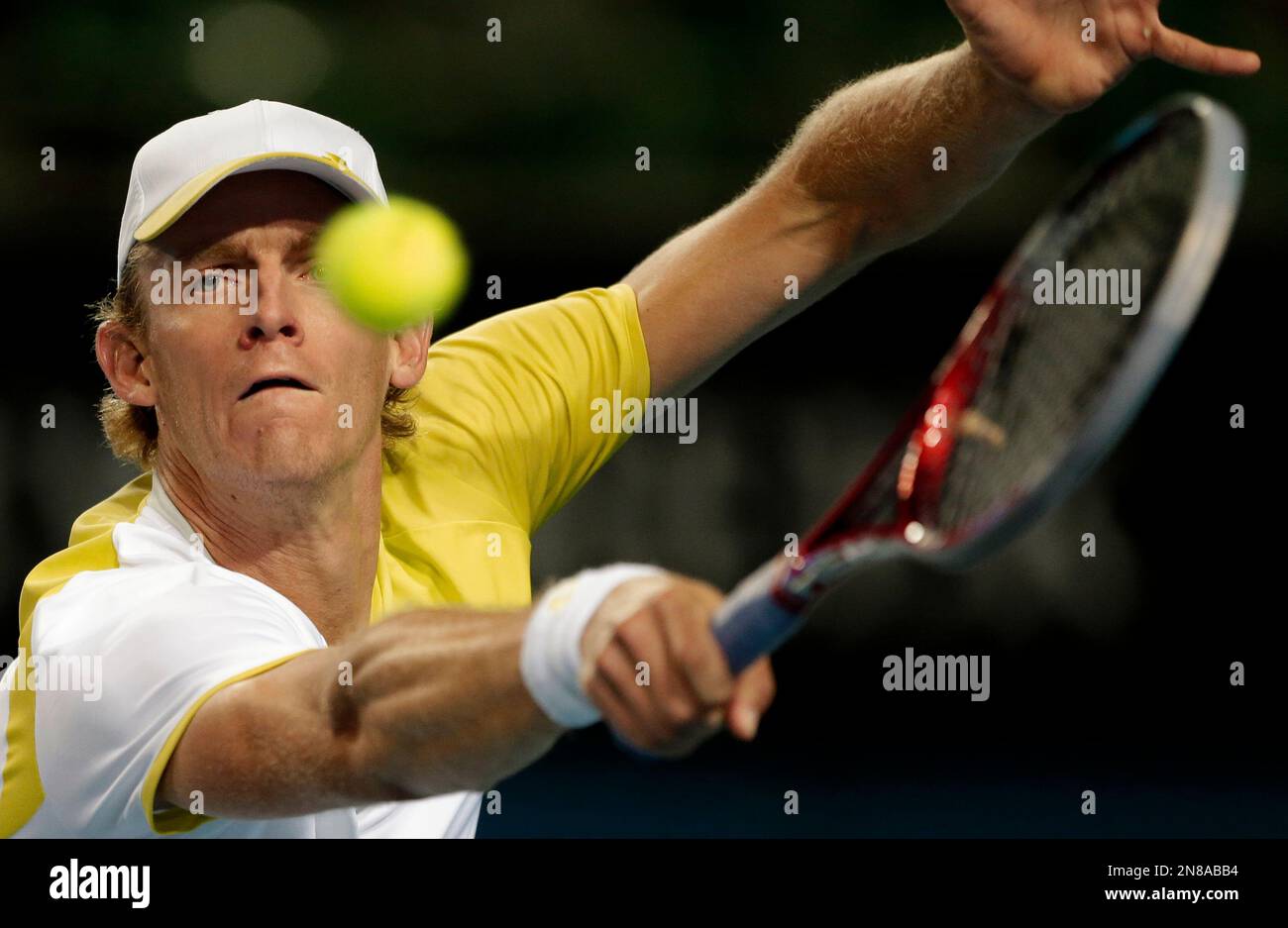 South Africa's Kevin Anderson makes a backhand return to Italy's Paolo  Lorenzi during their first round match at the Australian Open tennis  championship in Melbourne, Australia, Monday, Jan. 14, 2013. (AP Photo/Rob