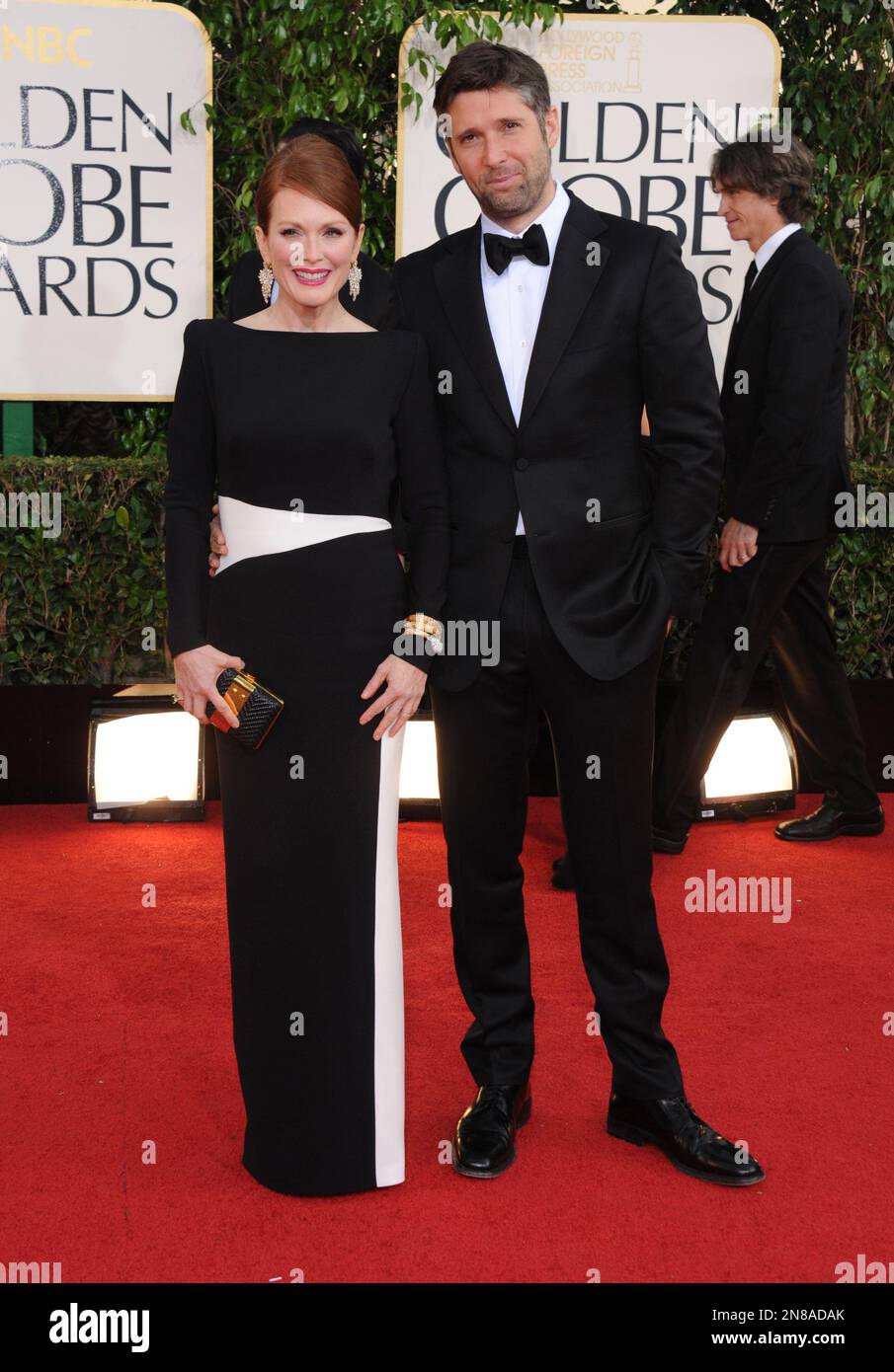 Actress Julianne Moore, left, and Bart Freundlich arrive at the 70th