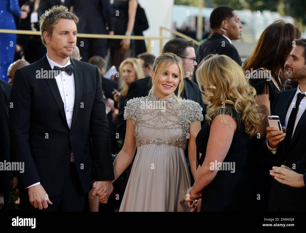 Actors Dax Shepard, left, and Kristen Bell arrive at the 70th Annual
