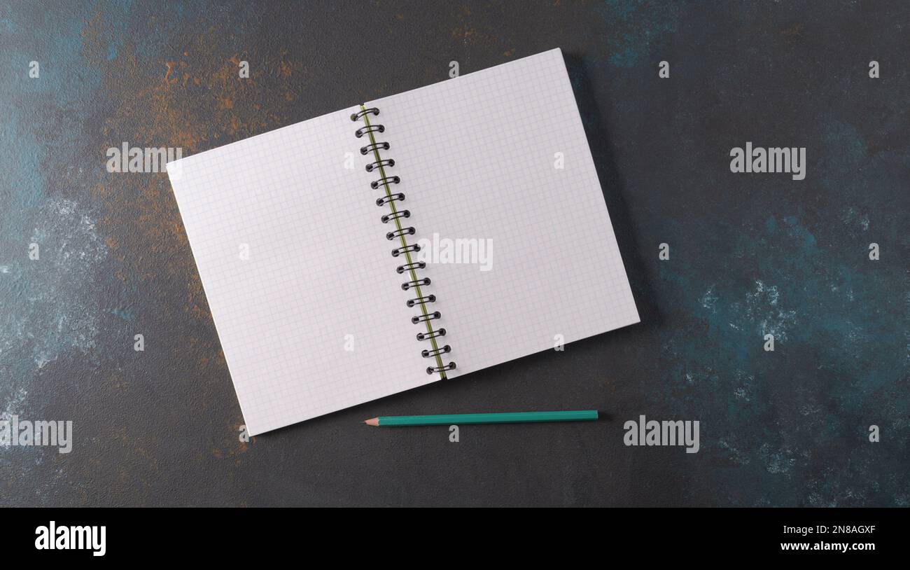 Spring Notebook Empty Mockup. An empty school notebook with a spiral spring in expanded form ...