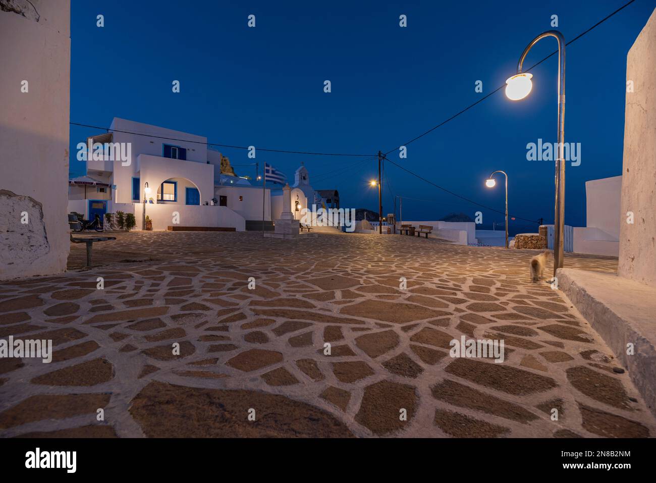 The main square of Chora village at nightfall, Anafi Stock Photo